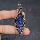 Carved Blue Sapphire Pendant