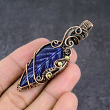 Carved Blue Sapphire Pendant