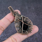 Carved Ammolite Gemstone Pendant